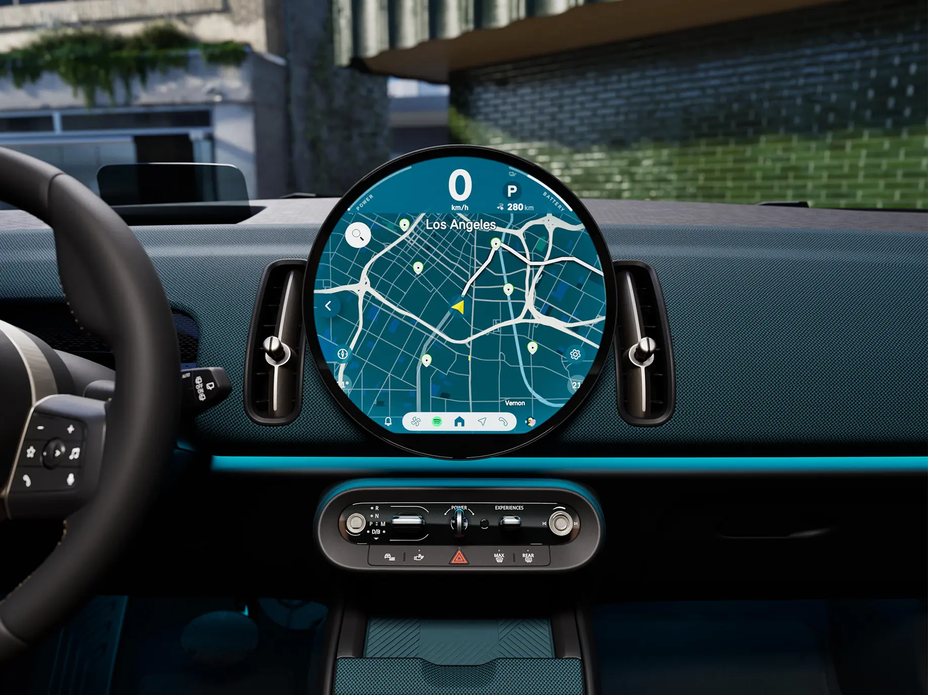 Detaljeret billede af interaktionsenheden i den fuldelektriske MINI Countryman med fokus på navigationen.