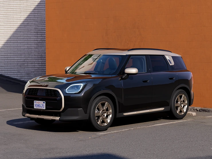 Parkeret MINI Countryman i Midnight Black og tag i Vibrant Silver set forfra.