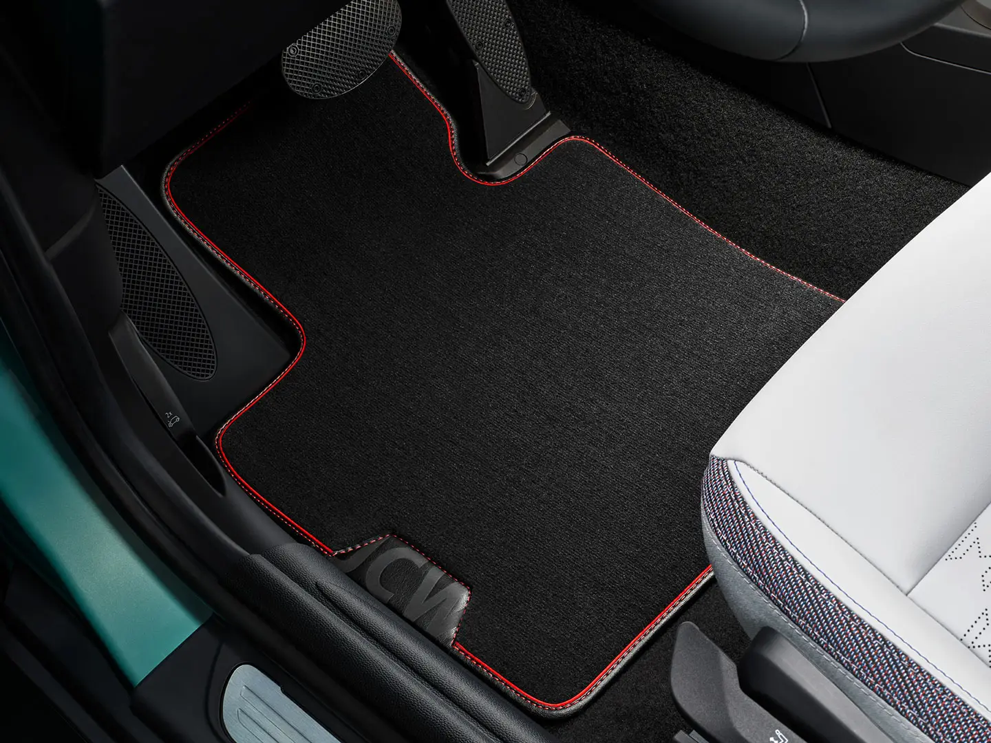MINI John Cooper Works tekstilgulvmåtte i fodrummet.