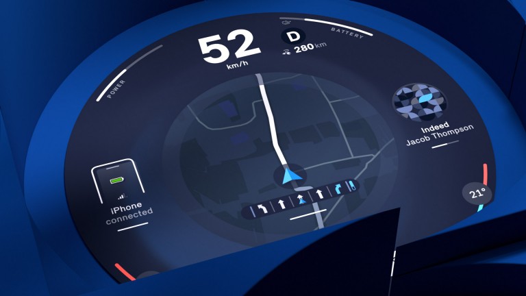  MINI rundt display, der viser hastigheds- og navigationsskærmen